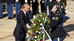 U.S. President Barack Obama lays a wreath at the Tomb of the Unknown Soldier on Veterans Day, at Arlington National Cemetery in Virginia